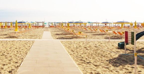 Riccione: 71 Beach with Umbrella, Sunbed, & Aperitif