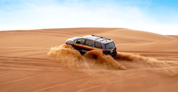 Safari nel deserto delle Dune Rosse, Quad, Sandboarding e Giro in cammello