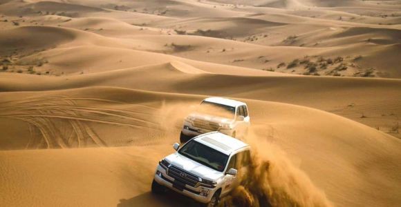Dubai: Jeep Desert Safari, Camel Ride, and Quad Bike Tour