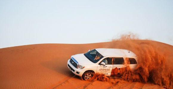 Dubai: Safari sulle dune rosse, giro in cammello, sandboarding e cena