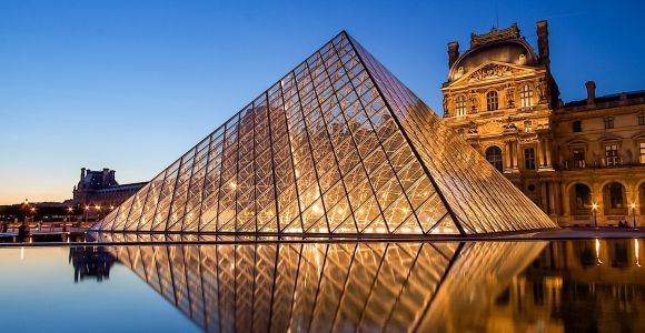 Parigi: Accesso riservato al Louvre e crociera in barca